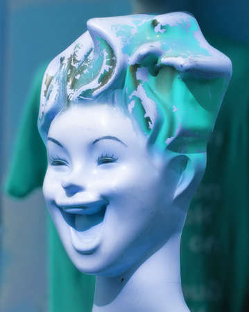 A photo of an old, colorful female mannequinの写真素材
