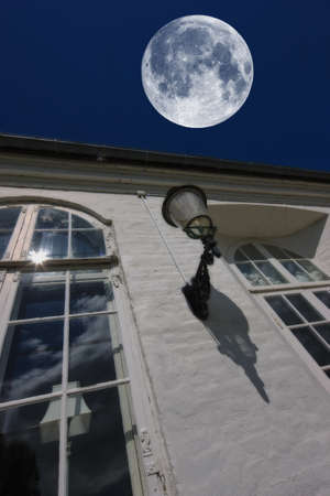 A photo of the full moon at nightの写真素材