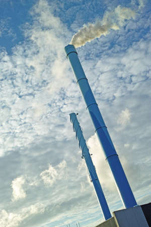 A photo of chimneys and smoke