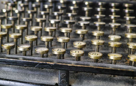 A photo close-up photo of an old and dusty typewriter - from 1917の写真素材