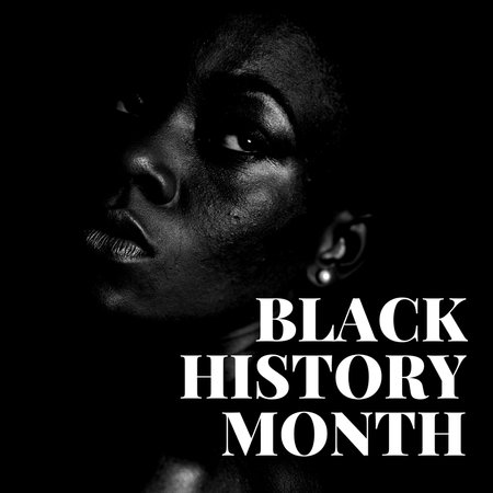 Black History Month. Portrait of beautiful african american woman on black background.の写真素材