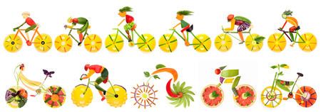 Fruits and vegetables in the shape of bike set with cyclists.の写真素材