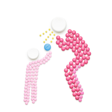 Creative health concept made of drugs, isolated on white. Adult person sneezing and spreading...