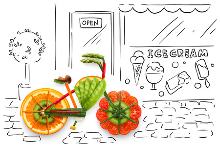 Creative food concept photo of a bicycle, made of fruits and vegs, parked on sketchy urban background.の写真素材