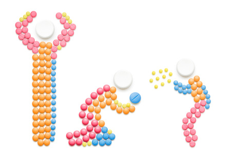 Creative health concept made of drugs, isolated on white. Sick child sneezing and spreading disease on adult.の写真素材
