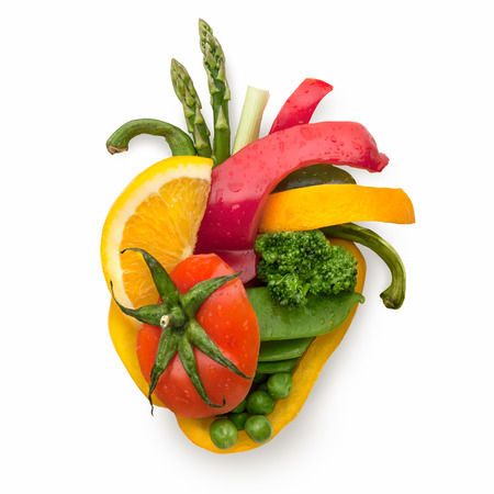 A healthy human heart made of fruits and vegetables as a food concept of smart eating.の写真素材
