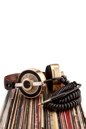 Retro headphones for professional audio with vintage vinyl records.の写真素材
