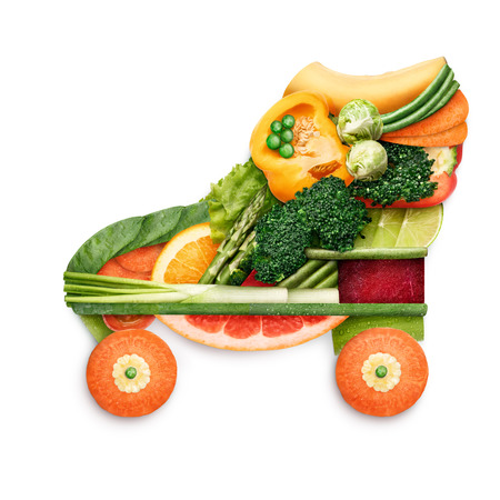 Healthy food concept of quad roller skates made of fresh vegetables and fruits full of vitamins, isolated on white.の写真素材