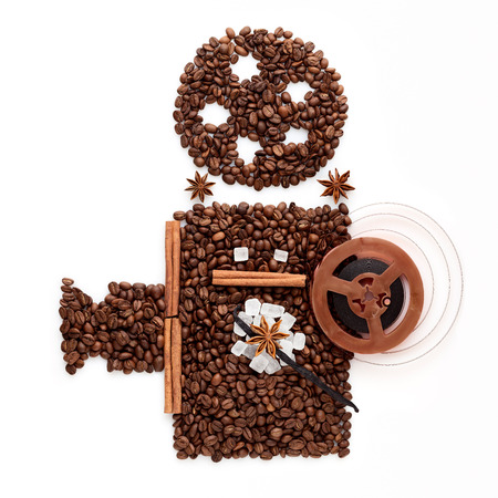 Coffee beans in the shape of an old movie projector for displaying cinema.の写真素材