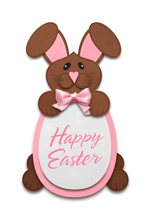 Creative easter concept photo of a rabbit with an egg made of paper on white background.の写真素材