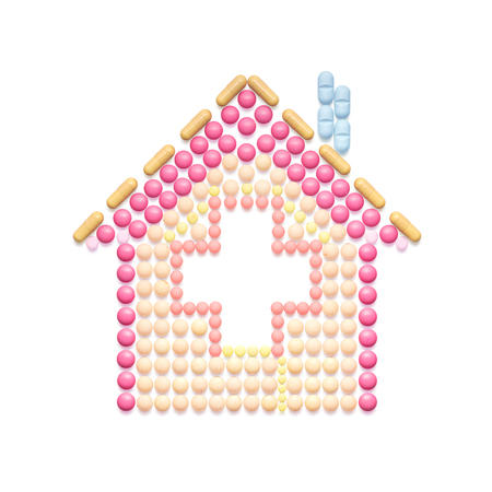 Creative medicine and healthcare concept made of pills in the shape of a house on white background.の写真素材