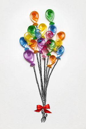 Creative concept photo of balloons made of paper on white background.の写真素材