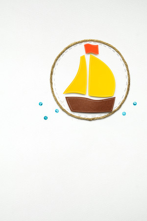 Creative concept photo of a boat made of paper on white background.の写真素材