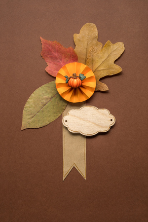 Creative thanksgiving day concept photo of leaves on brown background.の写真素材