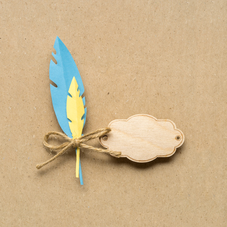 Creative thanksgiving day concept photo of feathers on brown background.の写真素材