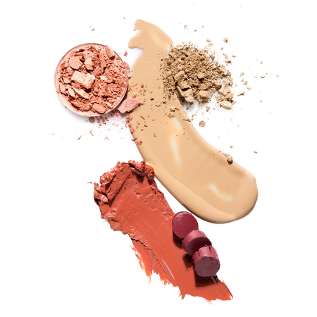 Creative concept photo of cosmetics swatches on white background.の写真素材