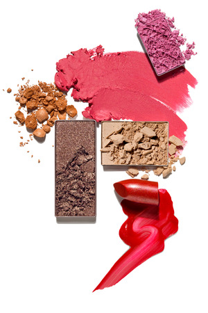 Creative concept photo of cosmetics swatches beauty products lipstick square eyeshadow on white background.の写真素材