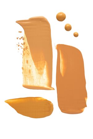 Creative concept photo of cosmetics swatches beauty products foundation cream on white background.の写真素材