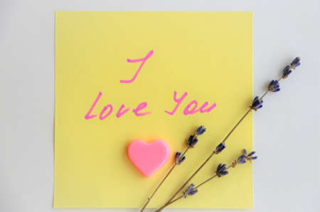 note with the inscription I love you with heart and lavender. High quality photo