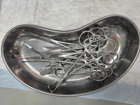 the medical instrument lies in a metal kidney. High quality photo