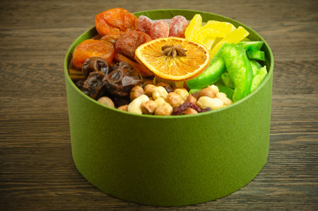 in the box nuts, dried fruits and candied fruits, a useful gift. High quality photoの写真素材