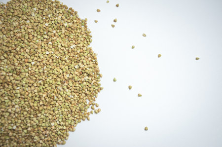green buckwheat on a white background. High quality photo