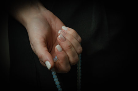 on a dark background light nails after manicure. High quality photoの写真素材