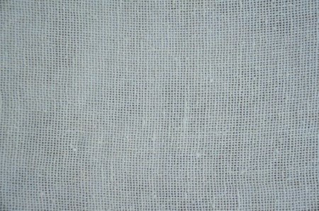 Textured background made of light-colored fabric. High quality photoの写真素材