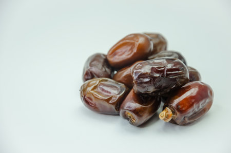 Dried dates on a white background. High quality photo