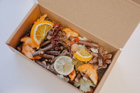Mix of fruit tree sticks, nuts and herbs for poultry and rodents, meat-free food.の写真素材