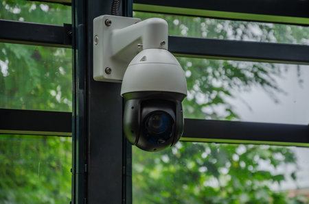 Surveillance camera mounted on the wall. High quality photoの写真素材
