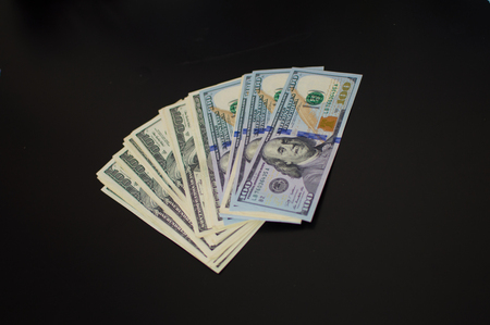 USD Money currency on black backgroundの写真素材