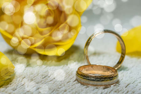 Background of wedding ring with rose decorationの写真素材