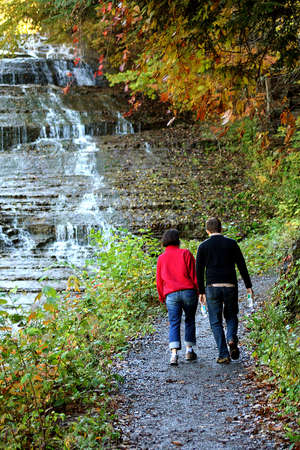 Couple on a nature walk in autumn.の写真素材