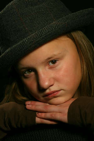 Close up of young girl wearing fedoraの写真素材