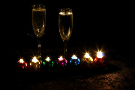 Champagne and Candlelight on blackの写真素材