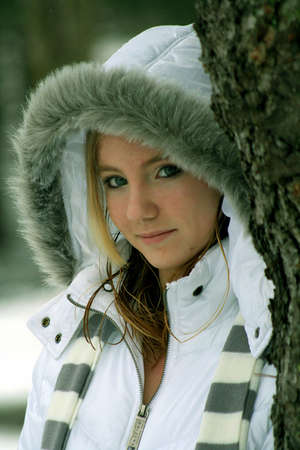 Close up of teenage girl outdoors in winterの写真素材
