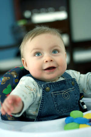 Adorable baby boy with expressive faceの写真素材
