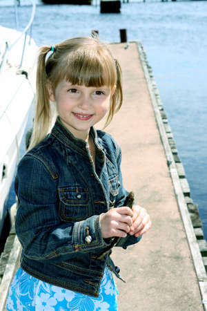 Little Girl on Dockの写真素材