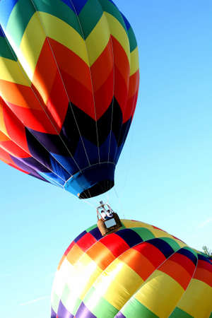 Two Hot Air balloons and blue skyの写真素材