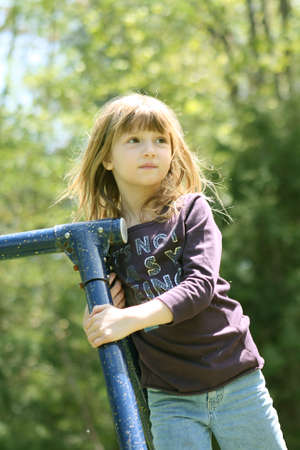 Little Girl on Swingsetの写真素材