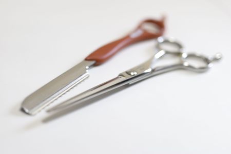 Red styling leather and cutting scissorsの写真素材