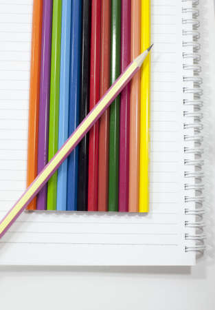 notebook and pencil isolated の写真素材
