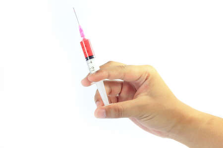 Color photograph of medical syringes with bloodの写真素材