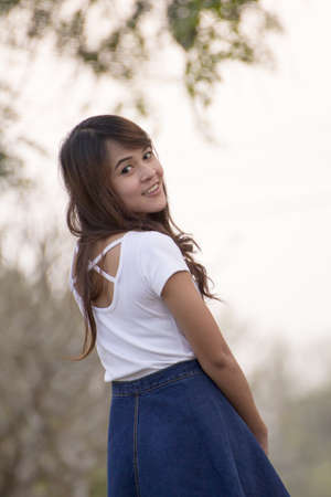 Portrait pretty woman wearing white shirts in Thailand.
