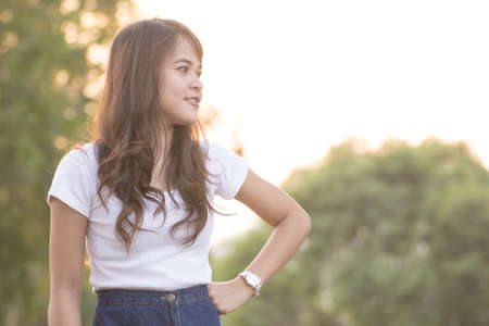 Portrait pretty woman wearing white shirts in Thailand.の写真素材