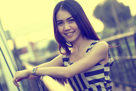 Close Up fashion  of a  autumn girl  wearing a striped Thailand.の写真素材