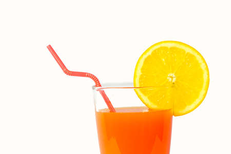 Orange juice and slices of orange on whiteの写真素材