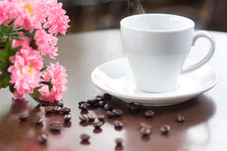 Coffee and sweets to tasty on a wooden floorの写真素材