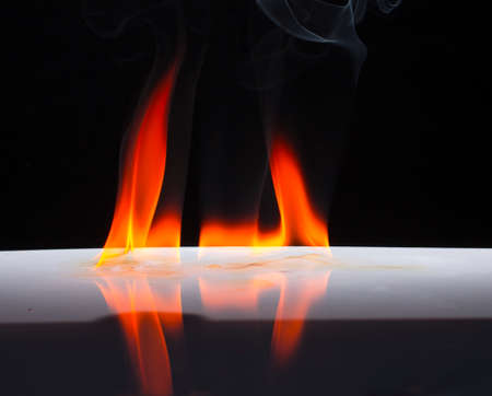 Fire flames on a  backgroundの写真素材